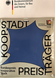 Plakette KOOP STADT (Foto)